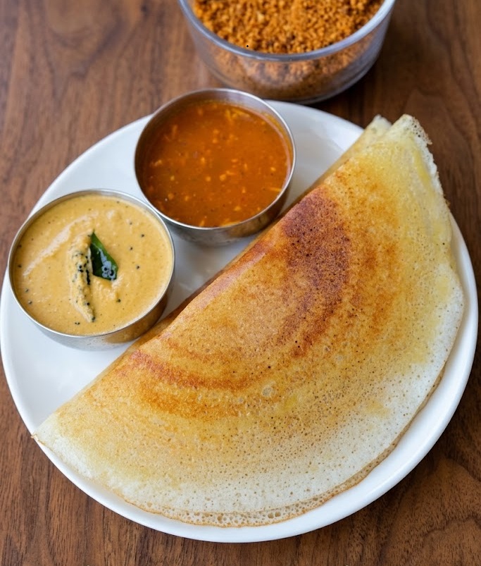 Crispy medu vada served with sambar and chutney at Dosa Dream in NE Calgary